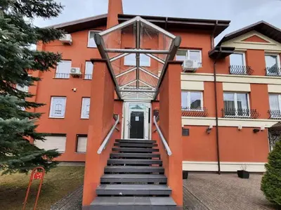 a staircase in front of a building with a building at Perlos Apartamentai 13 in Birštonas