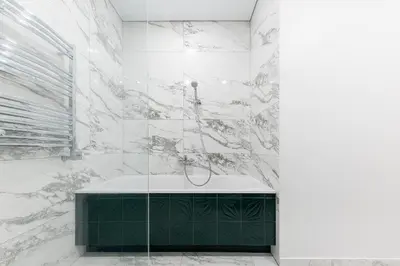 a bathroom with a shower with a bath tub at Vilnius legends house APARTMENT I Best for families I Free parking in Vilnius