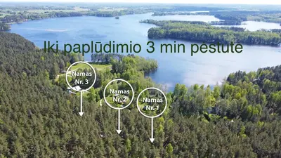 an aerial view of a lake with trees at Premium Forest Bungalow With Hot Tub & Sauna in Luokesos Sen