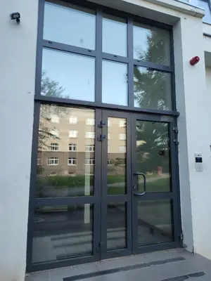 a large glass door on a building at GoodStopCenter in Vilnius