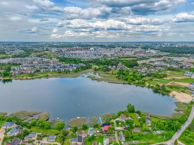 an aerial view of a lake in a city at Niwaki Sodai No 2 by URBAN RENT in Vilnius