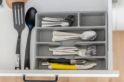 a drawer filled with utensils and utensils sidx sidx sidx sidx sidx at Close to Old Town & Amenities 1 in Vilnius