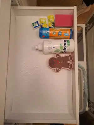 a white refrigerator with some items in it at Vyduno apartments 9 in Kaunas
