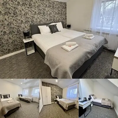 two pictures of a bedroom with a bed at Grey apartments 