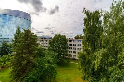 a view of a city with trees and buildings at Stylish Studio in Central Vilnius in Vilnius