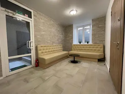a waiting room with two couches and a window at Modern guest house in city center I Room 1 in Vilnius